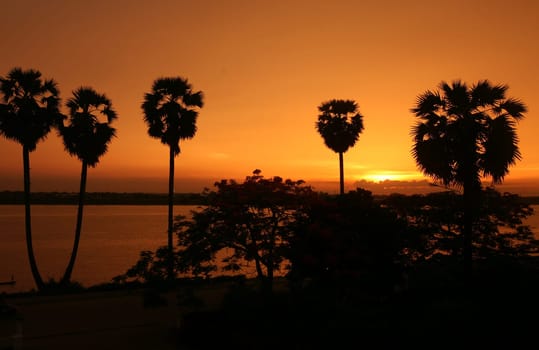 The landscape of the border river Mekong River in the town of Tha Khaek in central Laos on the border with Thailand in South East Asia.