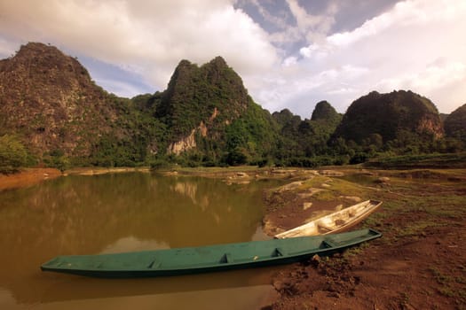 The hilly landscape on highway 12 between the city of Tha Khaek and the village of Mahaxai Mai in central Laos on the border with Thailand in South East Asia.