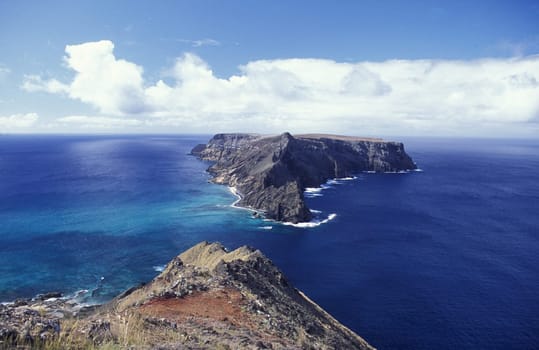 Europe,Atlantic Ocean,Portugal,Island,Madeira,Porto Santo,Sea,Landscape,Viewpoint,Miradouro,Ponta da Calheta,Island of Baixo oe da Cal,. The viewpoint at the Ponta de Calheta on the island of Porto Santo of The neighbouring island of Madeira in the Atlantic Ocean,Portugal,(Urs Flueeler)