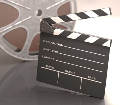 Clapboard on a reflective table with a roll of film on background.