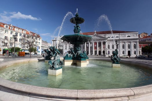 The square Rossio with the National Theatre in the old town of Lisbon in Portugal.