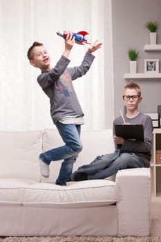 two boys playng as scientists and rocket inventors