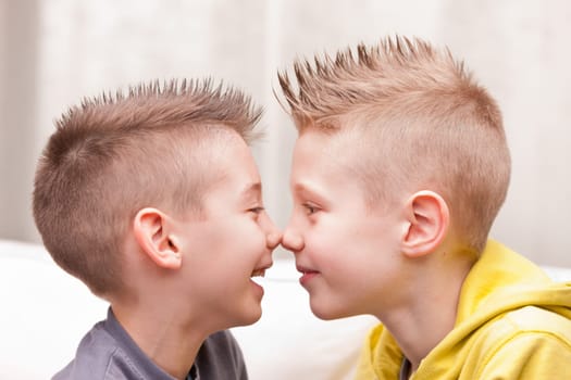 little boys nose to nose