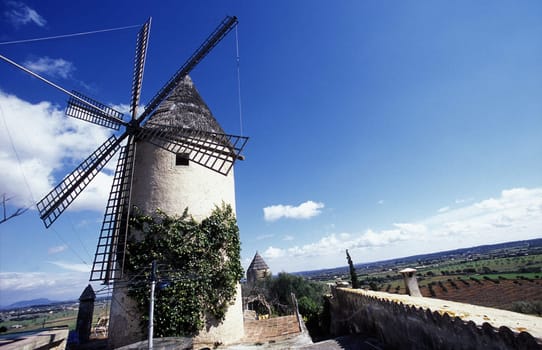 A traditional wind farm in Montuiri,which was used in agriculture,stands in the center of the island of Mallorca one of the Balearic islands in the Mediterranean.