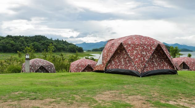 Camping tents by lake