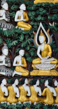 Native Thai sculpture on temple door