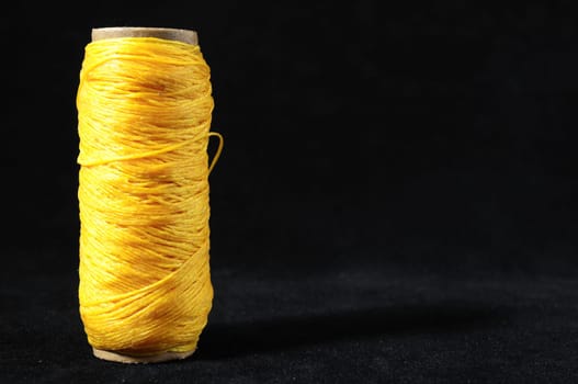 Roll of Twine isolated on a Black Background