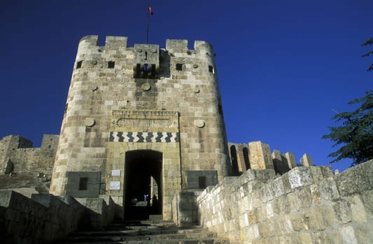 The citadel in the Old City of Aleppo in northern Syria in the Middle East in Arabia.