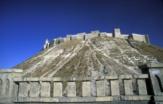 The citadel in the Old City of Aleppo in northern Syria in the Middle East.