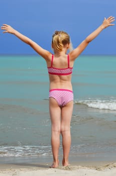 Little girl on the beach.