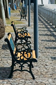Row of benches in the city park