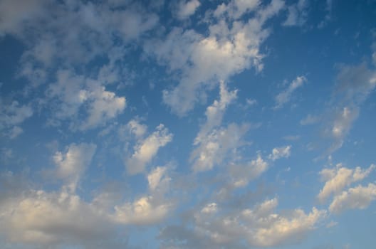 Cloudscape, Colored Clouds at Sunset near the Ocean