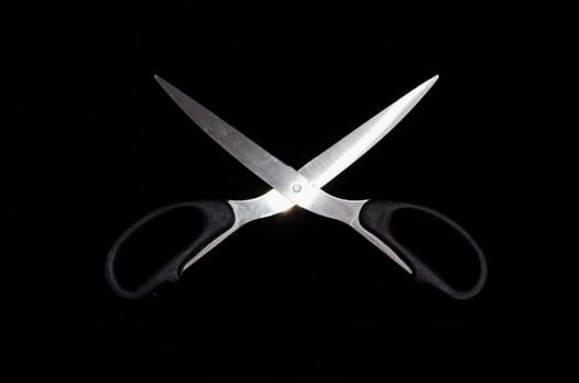 Classic Metal Scissors Isolated on a Black Background