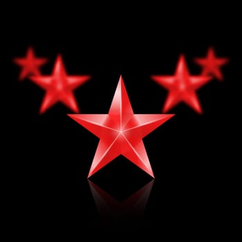 Five red stars on black background - the first one in focus, the others blurry.
