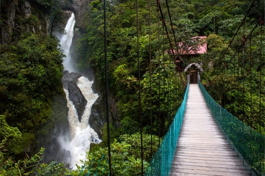 Paílón del Diablo - Mountain river and waterfall in the Andes. Banos. Ecuador