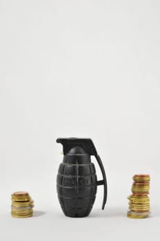 Money for War Concept Hand Grenade and Money