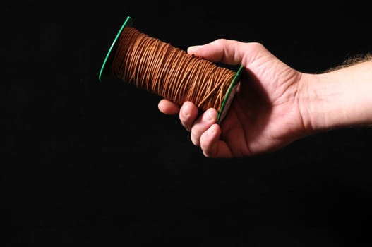 Roll of Twine isolated on a Black Background