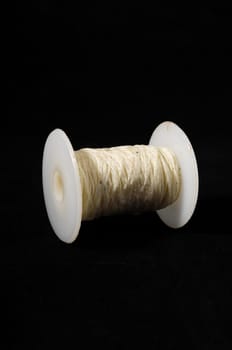 Roll of Twine isolated on a Black Background