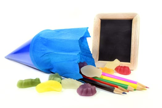 a school bag with crayons and sweets