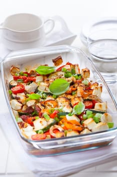 Baked vegetable with sheep cheese and herbs