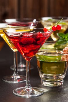Party cocktails and longdrinks garnished with fruits for summer