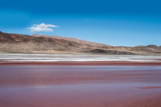 Salinas Grandes on Argentina Andes is a salt desert in the Jujuy Province. It is of industrial importance for its sodium and potassium mines. Salar de Uyuni is also located in the same region