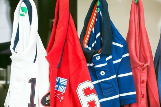 Close up of five Sport shirts in the clothes shop