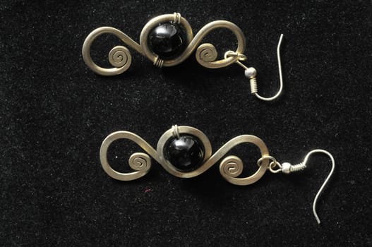 Handmade Silver Jewelry on a Black Background