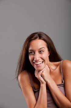 a smiling girl delighted about something gorgeous or a delicacy