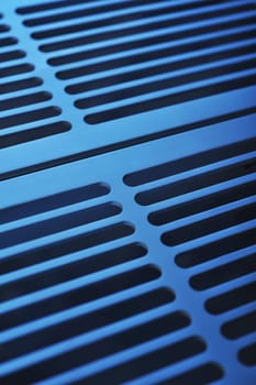 abstract industrial background made of aluminium ventilation grilles