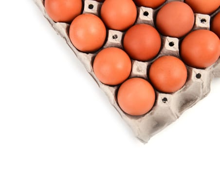 eggs in paper tray on white background