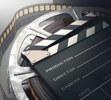 Clapperboard with rolls of film in the retro concept cinema.