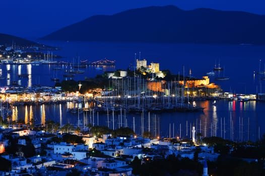 View of Bodrum harbor by night. Turkish Riviera.