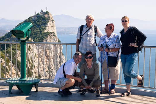 Portrait of happy tourist people on the Rock of Gibraltar.