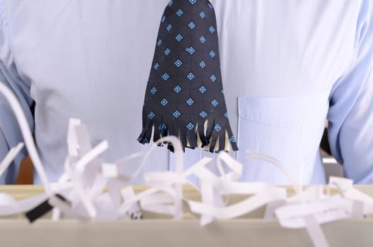 business man with shredded tie