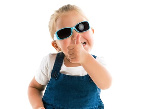 the little girl showing thumbs up