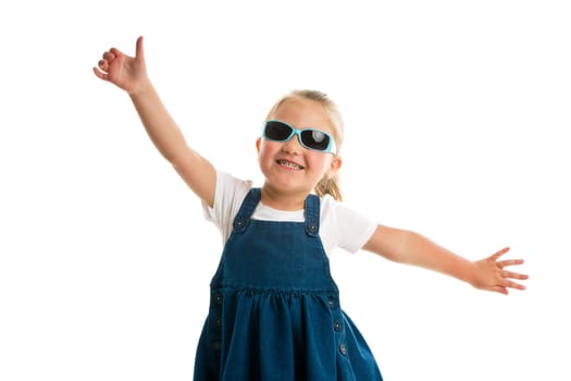 dancing little girl. studio shot