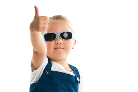 the little girl showing thumbs up