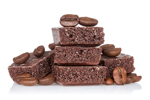 Picture of coffee beans and chocolate on a white background