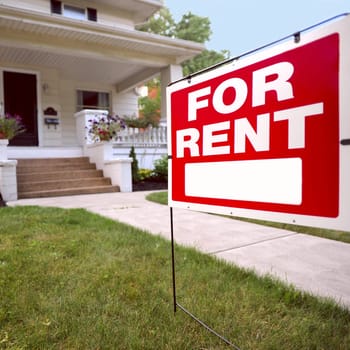 Home For Rent Sign in Front of Beautiful American Home