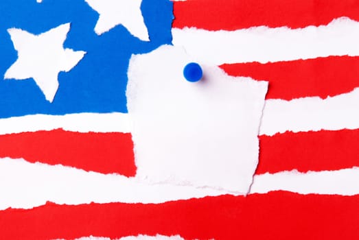 An American Flag out of Paper with a Notice Paper in the Middle with Copy Space