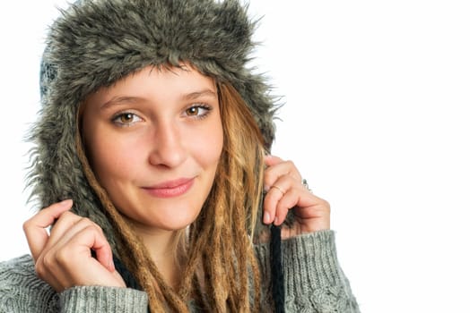 Girl with dreadlocks and fur hat