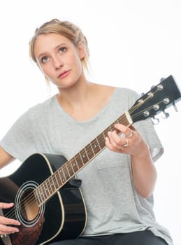 Blonde girl with a guitar