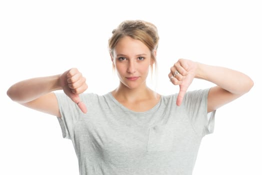 Blonde girl shows off her thumbs down