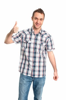 Young man in plaid shirt shows thumbs up