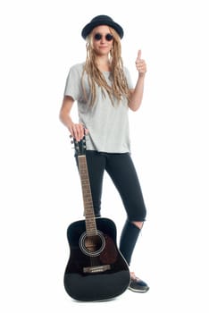 Blonde girl with hat and guitar