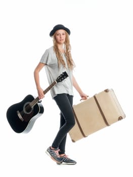 Girl with suitcase and guitar