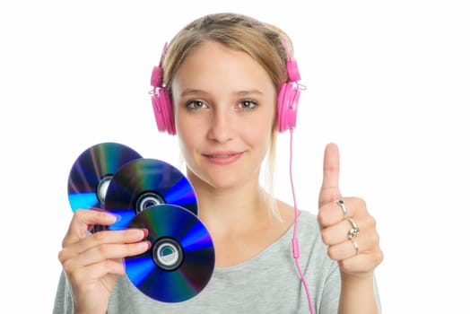 Blonde girl with headphones holds a few Cd blanks