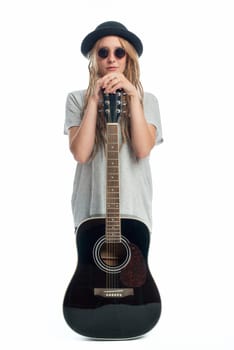 Blonde girl with hat and guitar
