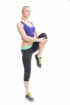 Blonde girl does gymnastics